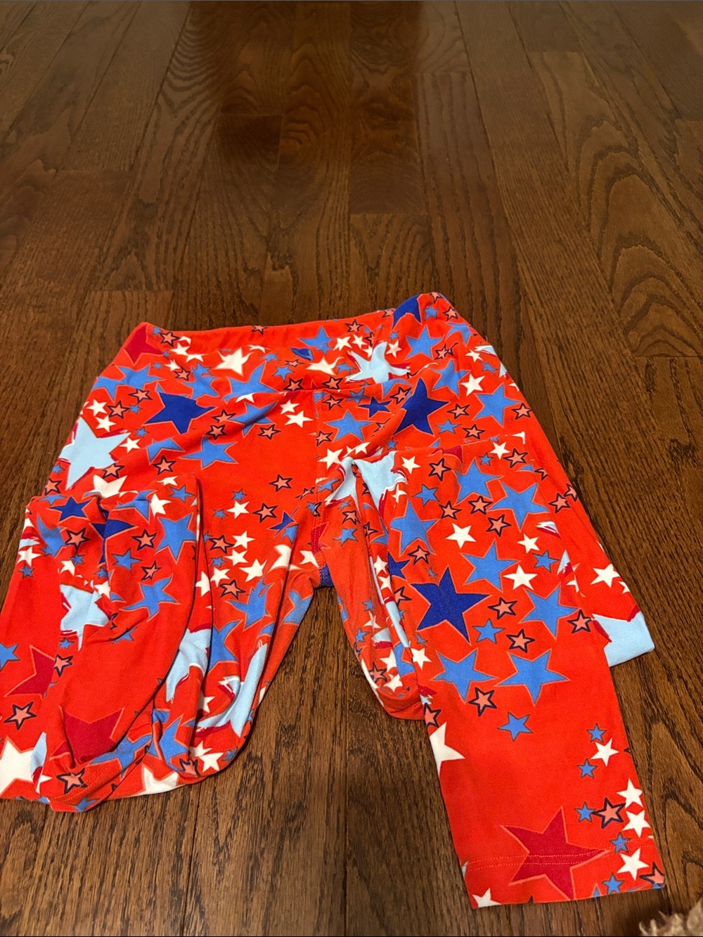 LuLaRoe women’s Red leggings with Blue & White Stars